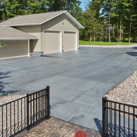 Custom Concrete Driveways Installation in Boston, MA Durable residential concrete driveways installed and warrantied by Boston Concrete Work, offering superior longevity compared to asphalt in Boston, MA